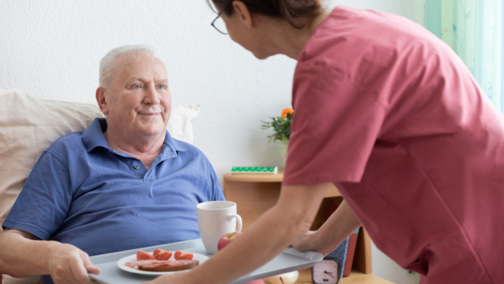 senior with caregiver