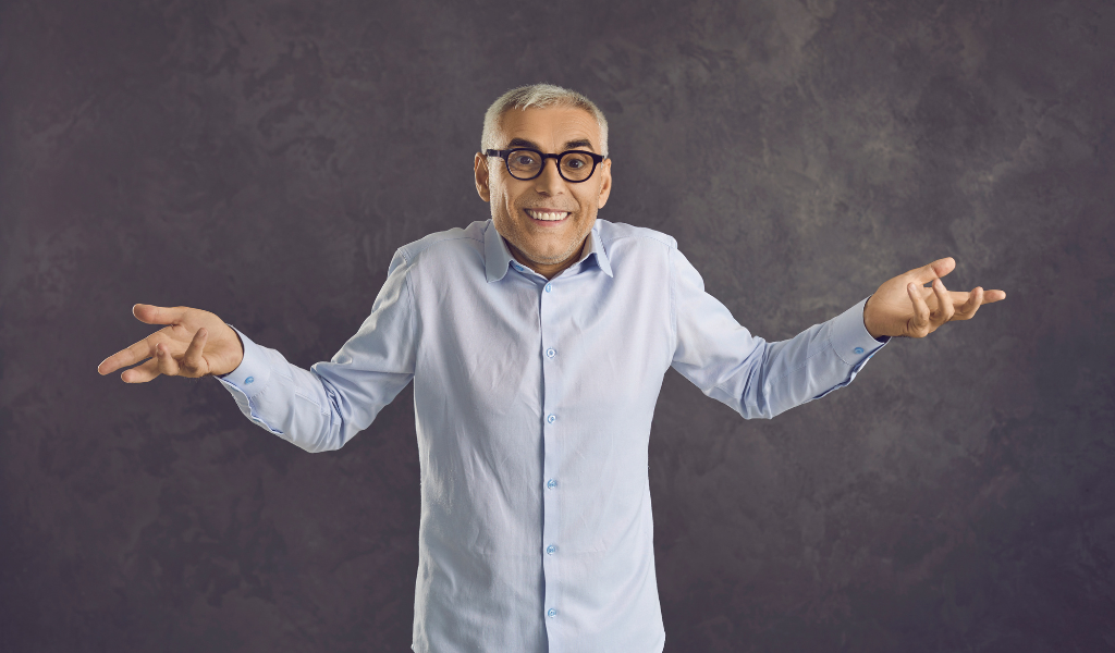 man raising his hands