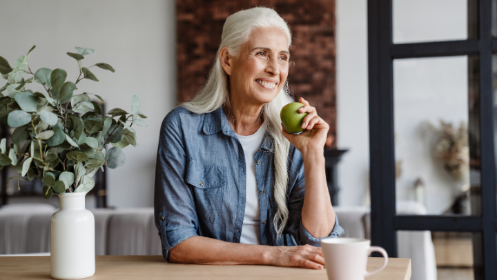 senior with apple