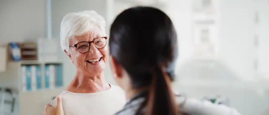 senior lady and nurse